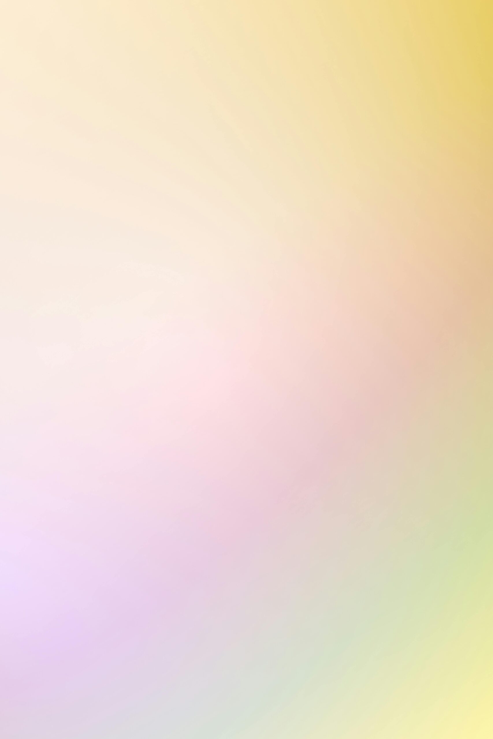 A soothing pastel gradient background with soft hues, perfect for digital wallpapers.